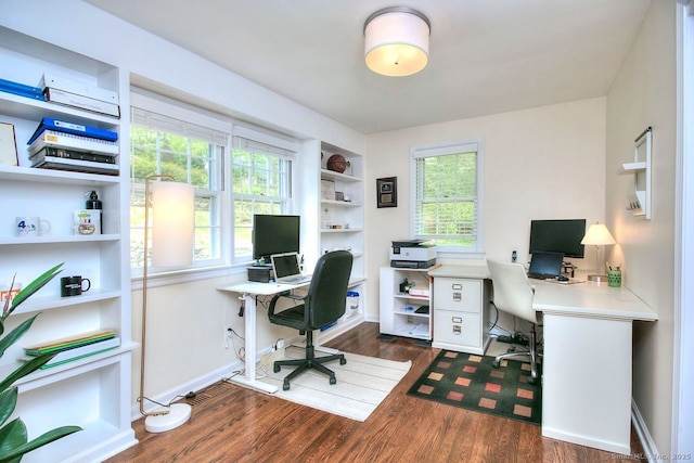 office space featuring baseboards and dark wood-style flooring