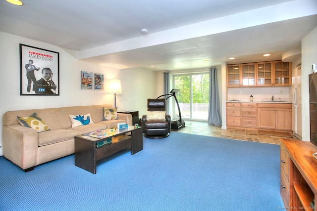 living room with light colored carpet and recessed lighting