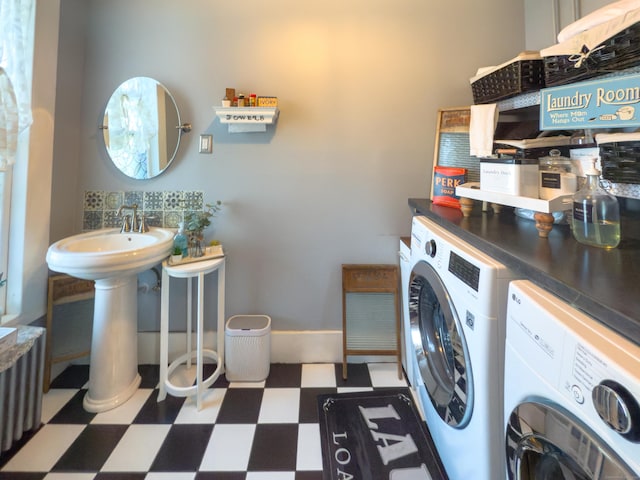 1063 Main St, South Windsor, CT 06074 - laundry area featuring washing machine and dryer and tile patterned floors
