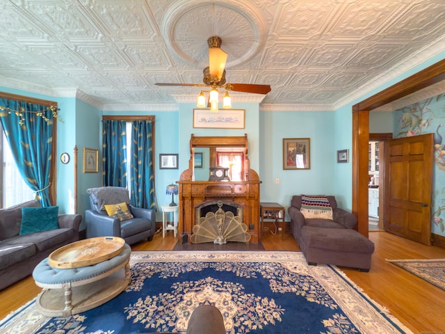 1063 Main St, South Windsor, CT 06074 - living room with wood finished floors, an ornate ceiling, and ceiling fan
