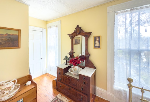 1063 Main St, South Windsor, CT 06074 - hallway with light wood finished floors and baseboards