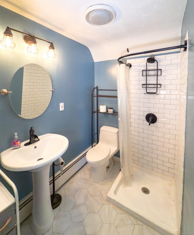 1063 Main St, South Windsor, CT 06074 - bathroom with tile patterned flooring, a shower stall, and a baseboard heating unit
