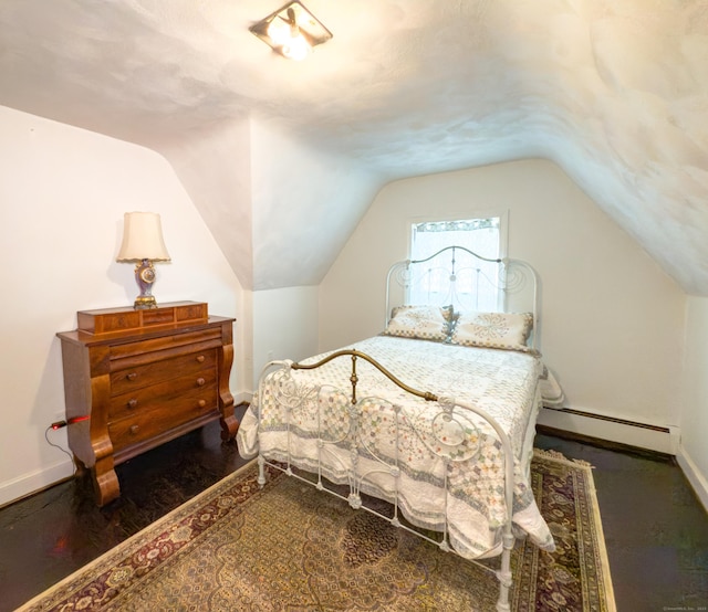 1063 Main St, South Windsor, CT 06074 - bedroom featuring a baseboard radiator, lofted ceiling, and wood finished floors