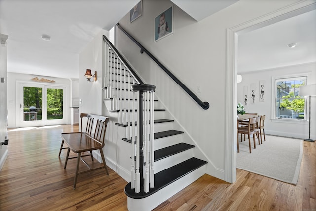 169 High Meadow Ln, Groton, CT 06355 - staircase featuring wood finished floors, healthy amount of natural light, and baseboards