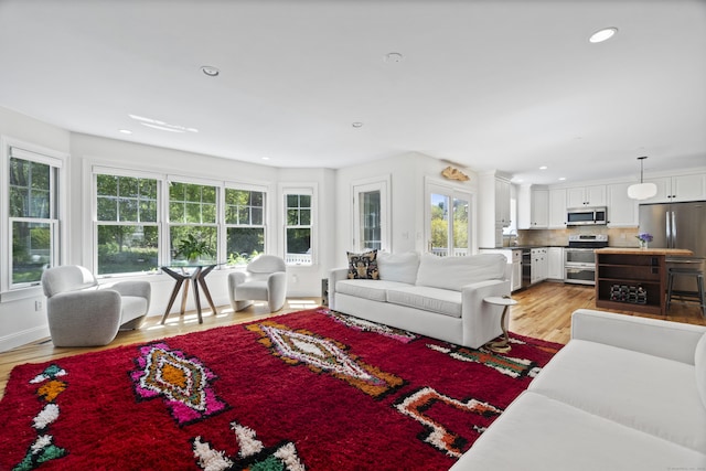 169 High Meadow Ln, Groton, CT 06355 - living room with light wood-style floors and recessed lighting