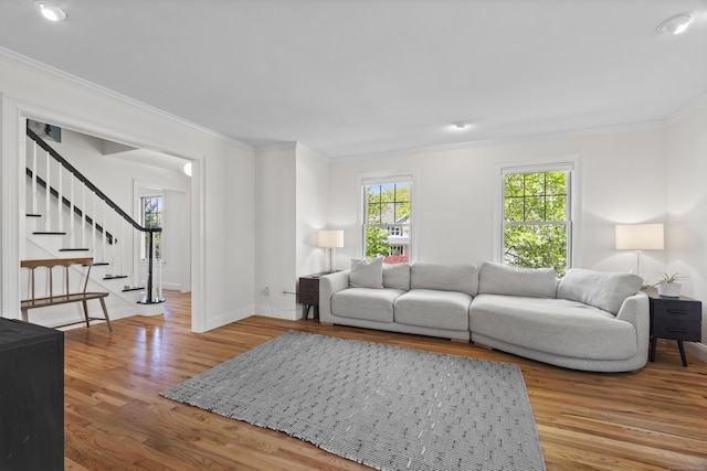 169 High Meadow Ln, Groton, CT 06355 - living area featuring crown molding, wood finished floors, stairs, baseboards, and recessed lighting