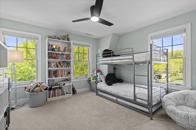 169 High Meadow Ln, Groton, CT 06355 - bedroom with multiple windows, carpet flooring, and baseboards