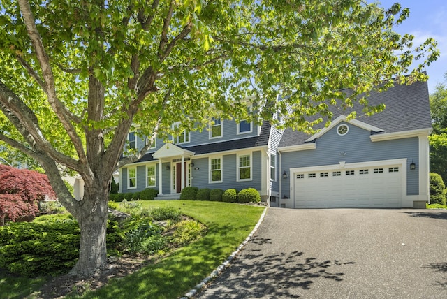 169 High Meadow Ln, Groton, CT 06355 - view of front of house featuring driveway, a garage, roof with shingles, and a front lawn