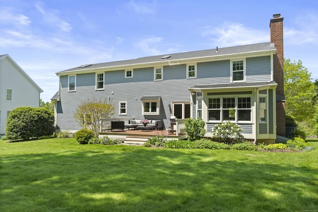 169 High Meadow Ln, Groton, CT 06355 - back of house with an outdoor hangout area, a chimney, a lawn, and a wooden deck