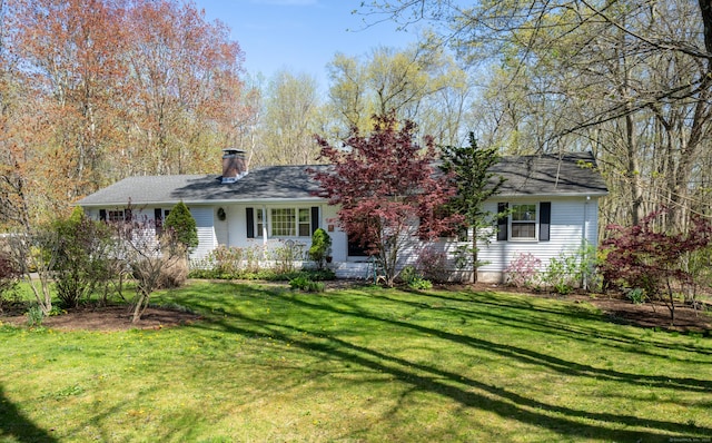 125 Northford Rd, Branford, CT 06405 - view of front of home featuring a chimney and a front lawn