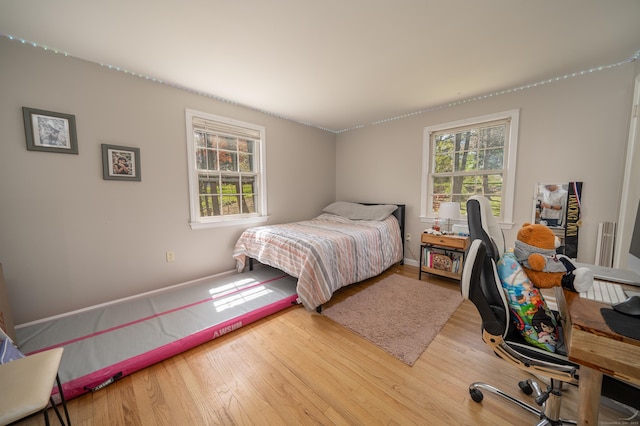 125 Northford Rd, Branford, CT 06405 - bedroom featuring baseboards and wood finished floors