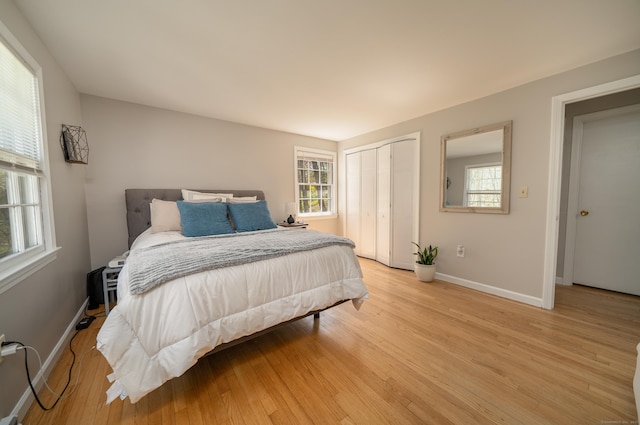 125 Northford Rd, Branford, CT 06405 - bedroom with baseboards, light wood finished floors, and a closet