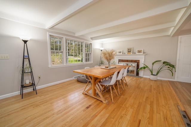 125 Northford Rd, Branford, CT 06405 - dining space featuring baseboards, beam ceiling, and light wood-style flooring