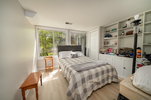 125 Northford Rd, Branford, CT 06405 - bedroom with baseboards, light wood finished floors, and visible vents