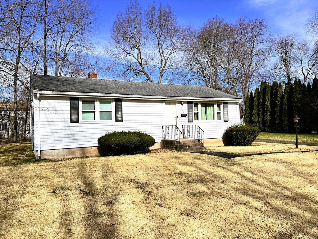 view of front of property with a chimney