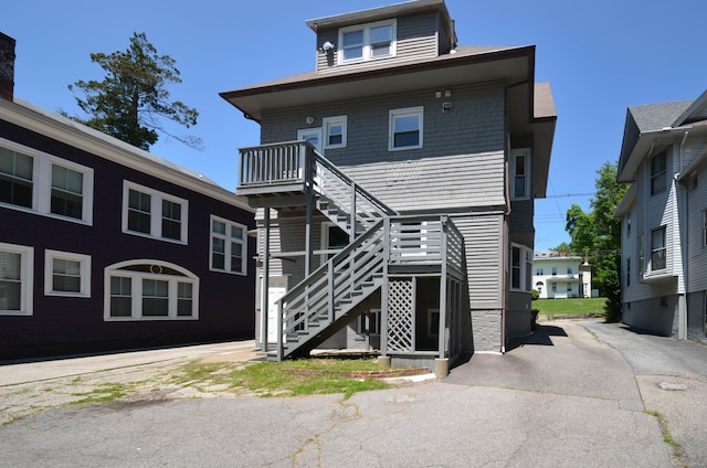 93 Broad St, Norwich, CT 06360 - rear view of house with stairway