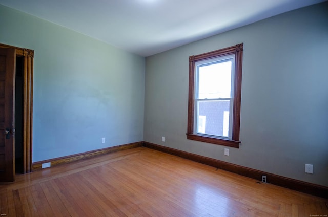 93 Broad St, Norwich, CT 06360 - spare room featuring wood finished floors and baseboards