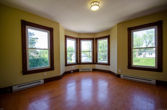 93 Broad St, Norwich, CT 06360 - spare room featuring a baseboard radiator and plenty of natural light