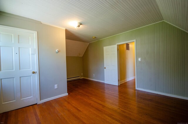 93 Broad St, Norwich, CT 06360 - bonus room with lofted ceiling, wood finished floors, baseboards, and a baseboard heating unit