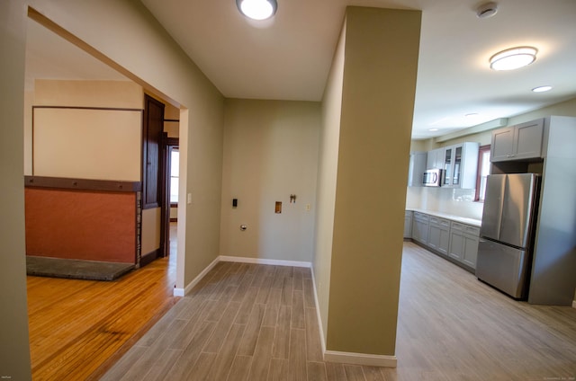 93 Broad St, Norwich, CT 06360 - hall with light wood-type flooring and baseboards
