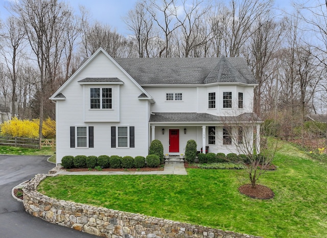 158 N Seir Hill Rd, Norwalk, CT 06850 - view of front of property featuring roof with shingles, fence, and a front yard