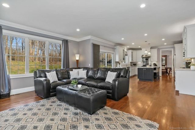 158 N Seir Hill Rd, Norwalk, CT 06850 - living area with ornamental molding, baseboards, recessed lighting, and wood finished floors