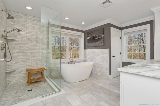 158 N Seir Hill Rd, Norwalk, CT 06850 - full bathroom featuring a tile shower, a freestanding bath, ornamental molding, and visible vents