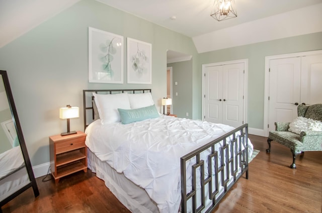 158 N Seir Hill Rd, Norwalk, CT 06850 - bedroom featuring baseboards, multiple closets, wood finished floors, and vaulted ceiling
