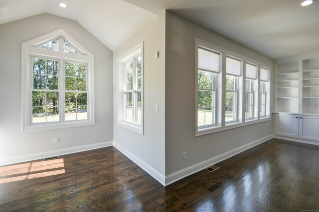 1481 Marion Rd, Cheshire, CT 06410 - empty room with healthy amount of natural light, dark wood finished floors, baseboards, recessed lighting, and lofted ceiling