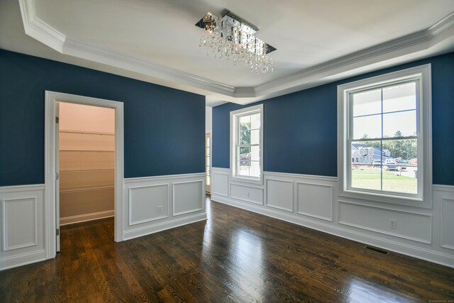 1481 Marion Rd, Cheshire, CT 06410 - spare room featuring ornamental molding, a chandelier, wainscoting, dark wood-style flooring, and a tray ceiling