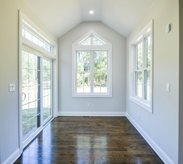 1481 Marion Rd, Cheshire, CT 06410 - empty room featuring healthy amount of natural light, lofted ceiling, dark wood finished floors, and baseboards