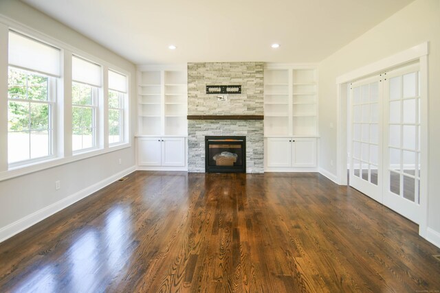 1481 Marion Rd, Cheshire, CT 06410 - unfurnished living room featuring built in features, dark wood finished floors, a fireplace, and baseboards