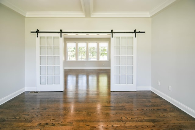 1481 Marion Rd, Cheshire, CT 06410 - empty room with a barn door, ornamental molding, dark wood-type flooring, and baseboards