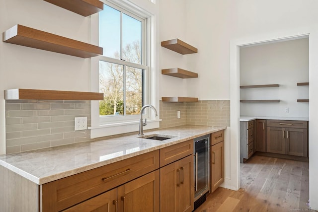 7 Egret Rd, Stonington, CT 06355 - kitchen featuring open shelves, beverage cooler, and light wood finished floors