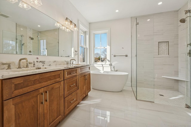 7 Egret Rd, Stonington, CT 06355 - bathroom featuring a shower stall, a soaking tub, double vanity, and recessed lighting