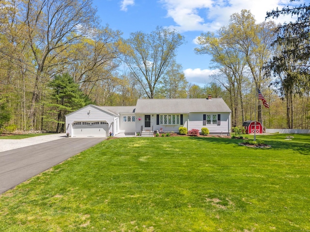 8 Dean Rd, East Lyme, CT 06333 - single story home featuring an attached garage, a shed, asphalt driveway, a chimney, and an outdoor structure