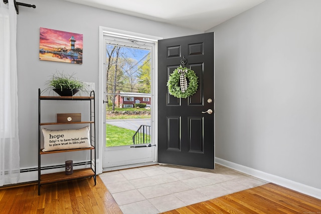 8 Dean Rd, East Lyme, CT 06333 - foyer entrance with light wood finished floors and baseboards