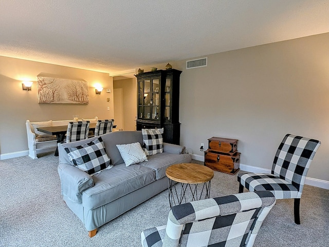 374 Heritage Vlg Unit C, Southbury, CT 06488 - living area with baseboards, carpet flooring, and visible vents
