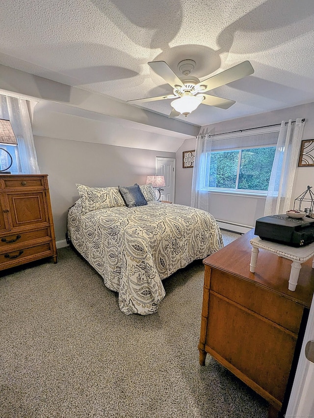 374 Heritage Vlg Unit C, Southbury, CT 06488 - bedroom with carpet floors, ceiling fan, baseboard heating, and a textured ceiling