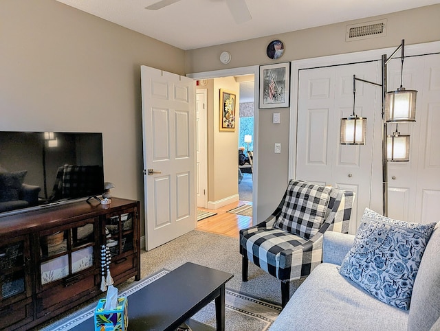374 Heritage Vlg Unit C, Southbury, CT 06488 - living area with visible vents, ceiling fan, and light carpet