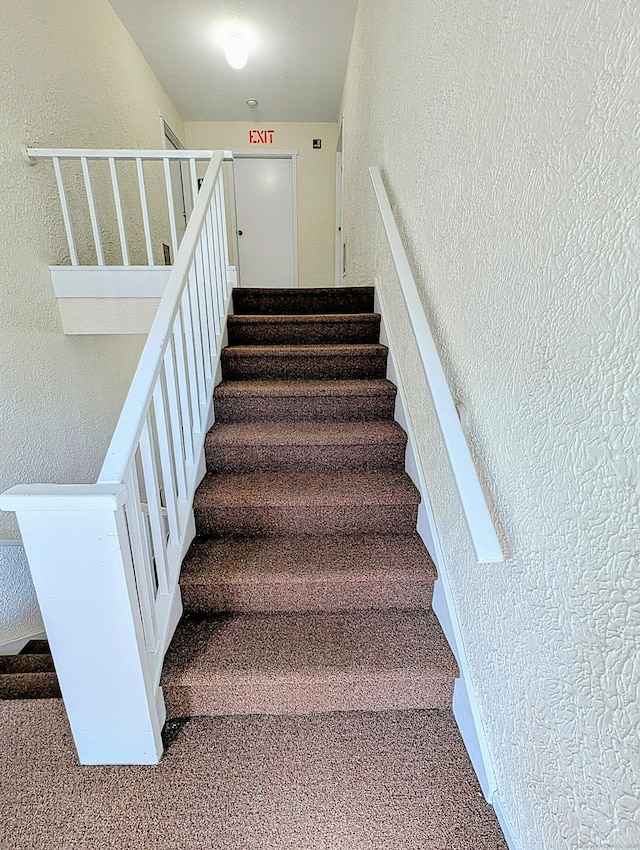 374 Heritage Vlg Unit C, Southbury, CT 06488 - staircase with carpet floors and a textured wall