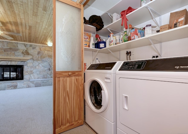 laundry room featuring independent washer and dryer, light carpet, laundry area, and wooden ceiling