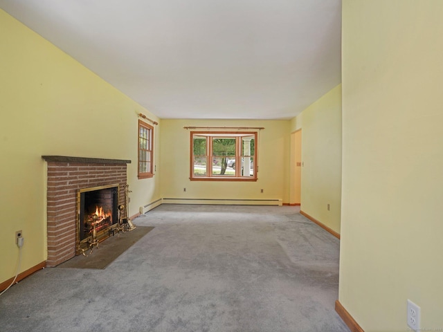 unfurnished living room featuring a baseboard radiator, carpet, baseboards, and a fireplace