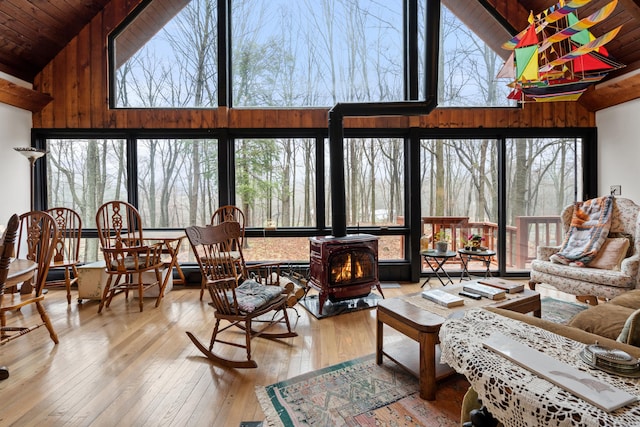 162 Hattertown Rd, Newtown, CT 06470 - sunroom / solarium featuring a wood stove, high vaulted ceiling, wooden ceiling, and hardwood / wood-style floors