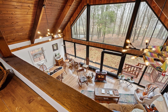 162 Hattertown Rd, Newtown, CT 06470 - living area featuring healthy amount of natural light, wood finished floors, wood ceiling with exposed beams, and high vaulted ceiling