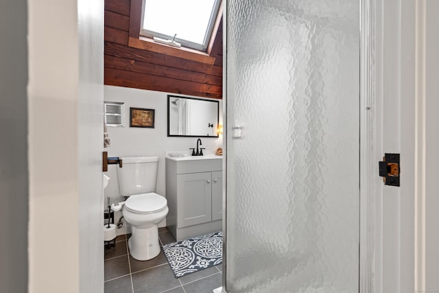 162 Hattertown Rd, Newtown, CT 06470 - full bath with tile patterned floors, toilet, vanity, a skylight, and a stall shower