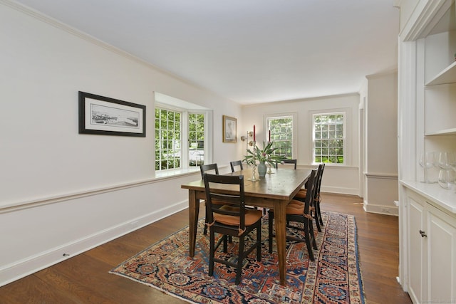 167 Skunk Ln, Wilton, CT 06897 - dining room with dark wood finished floors, healthy amount of natural light, ornamental molding, and baseboards