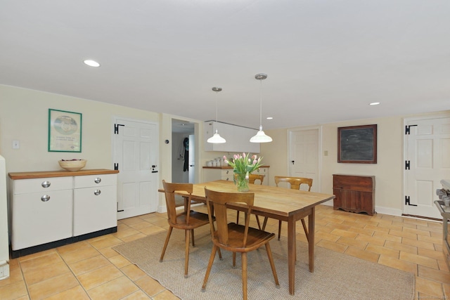 167 Skunk Ln, Wilton, CT 06897 - dining room featuring light tile patterned floors, baseboards, and recessed lighting