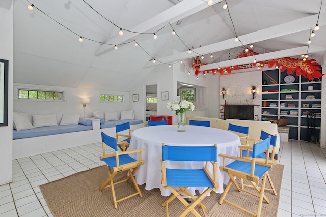 167 Skunk Ln, Wilton, CT 06897 - dining space with high vaulted ceiling, tile patterned floors, and beamed ceiling