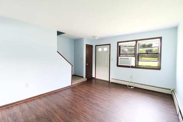 unfurnished room featuring dark wood-style flooring, cooling unit, a baseboard heating unit, and stairway